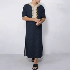 Detailed view of men's V-neck printed long robe featuring contrast embroidery and side slits.