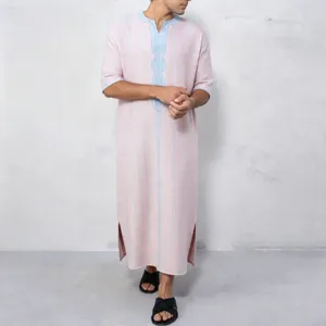 Men's traditional striped long robe detail view, showing the V-neck and pink fabric.