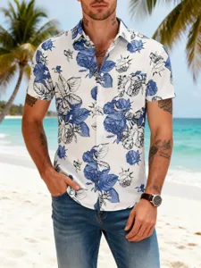 Detail shot of men's blue and white floral short sleeve resort shirt with lapel on beach.