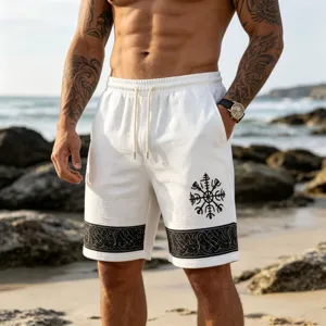 Close-up of men's linen-blend beach shorts featuring unique Viking rune print and drawstring waist.