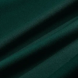 Dark green fabric detail, close-up textile texture, soft and breathable material close shot.