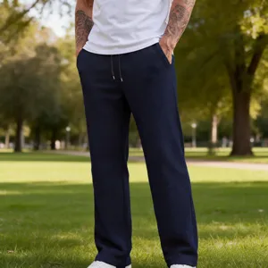 Pantaloni casual da uomo in maglia waffle blu scuro con comodo cordoncino regolabile in vita.