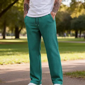 Pantaloni casual da uomo in maglia waffle con comodo cordoncino in vita e gamba dritta.