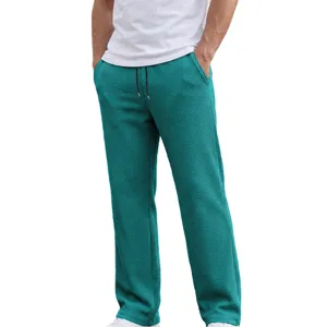 Pantalone casual uomo in maglia waffle gamba dritta monocolore cordino vita dettaglio