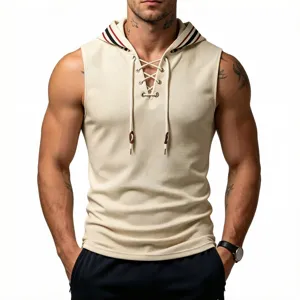 Close-up view of the stylish men's waffle knit sleeveless hoodie featuring lace-up front details.