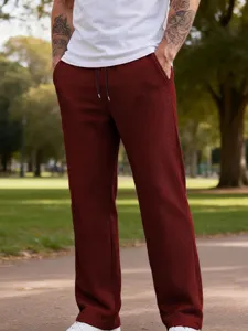 Pantaloni casual da uomo in maglia waffle, pantaloni dritti con coulisse in vita per uso quotidiano.