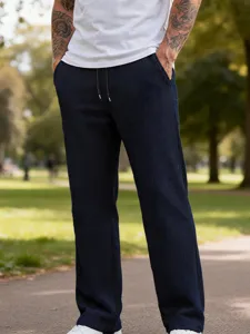 Pantaloni casual dritti in maglia waffle da uomo in blu scuro con coulisse in vita.