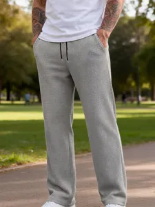 Pantaloni casual dritti da uomo in maglia waffle con coulisse in vita tinta unita