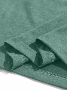 Detailed close-up shot of men's casual cotton t-shirt fabric texture and neat double stitching.