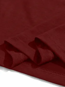 Close-up detail shot of men's casual t-shirt fabric, showing fine stitching and soft texture.