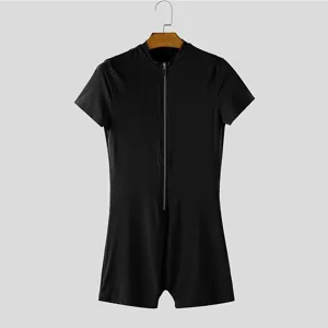 Front zipper detail view of the black short sleeve one piece slim fit mens bodysuit.