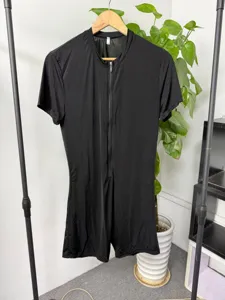Detail view of men's short sleeve front zip slim fit black jumpsuit romper, stylish casual wear.