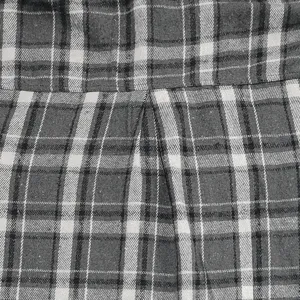 Close-up detail of grey black white plaid flannel fabric shirt texture winter autumn men style