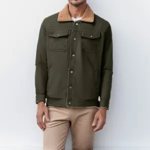 Detail view of men winter fleece lined workwear jacket featuring cozy sherpa collar and buttons.