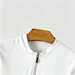 White men short sleeve zip up top detail close-up view premium knitwear stretchy fabric
