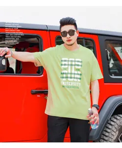 Casual loose men's short sleeve T-shirt with graphic print, comfortable green cotton top.