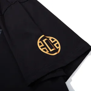 Men's black short sleeve t-shirt featuring stylish gold print, casual loose plus size tee.