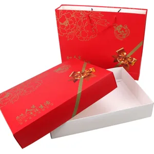 Red gift box set with lid and matching bag, elegant gold floral design for weddings.