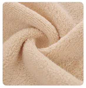 Close-up detail of soft pure cotton solid color towel fabric texture, cozy and absorbent.