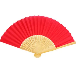 Elegant red 7-inch DIY paper folding fan with carved bamboo ribs for wedding events