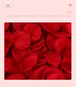 Close-up detail of realistic red silk artificial rose petals for wedding party decor