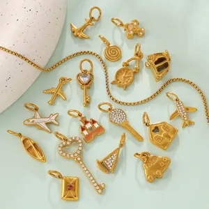 Assorted vintage 18K gold plated charms including airplane and key for DIY jewelry making