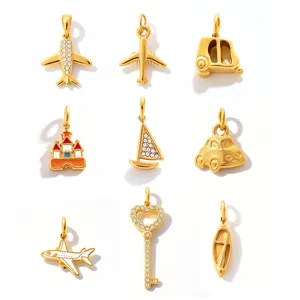 Assorted 18K gold plated DIY jewelry charms featuring airplane, key and sailboat shapes