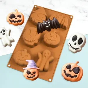 Halloween silicone mold for chocolate and candy featuring pumpkin and skull shapes