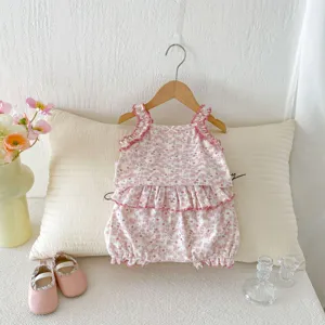 Cute baby girl floral summer camisole and bloomers two-piece set with delicate ruffles.