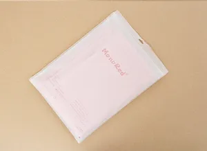 Pink waffle weave cotton bath towel packaged in a frosted clear ziplock bag neatly.