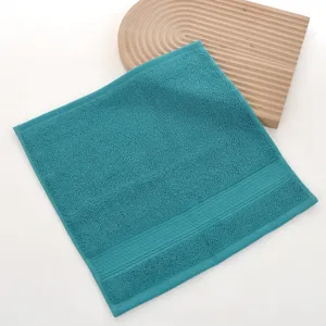 Soft pure cotton square face towel, solid color teal washcloth for daily home bathroom use.