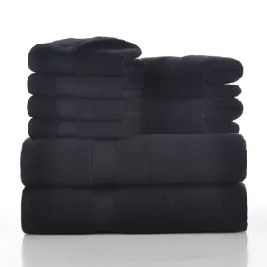 Premium black cotton towel set 8-piece, soft and highly absorbent for home bathroom use.