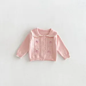 Pink knitted cardigan detail featuring lapel collar and sweet bow embroidery for baby girls