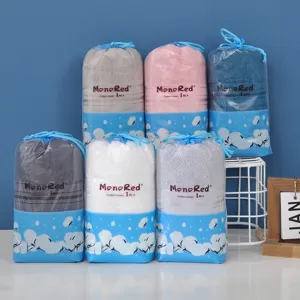 Wholesale pure cotton towels in drawstring bags, multi-color soft hotel bath towels.