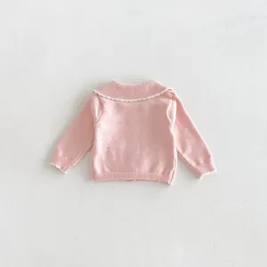 Pink baby girl knitted cardigan featuring a delicate scalloped white collar and matching sleeve cuffs.