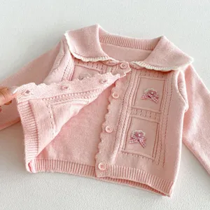 Cute pink baby girl knit cardigan featuring sailor collar and sweet plaid bow details.