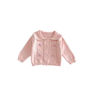 Cute pink baby girl knit cardigan with lapel collar, sweet bows, and cozy autumn style top.