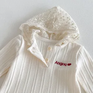 Baby girls ribbed knit hoodie with delicate lace trim, soft cotton fabric, detailed top view.