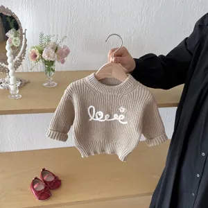 Baby girls knit sweater detailed shot, cute crew neck pullover with love embroidery.