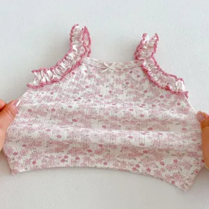 Cute baby girl floral summer tank top with delicate ruffles and sweet bow detail for daily wear.