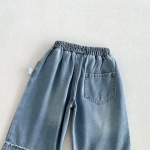 Girls loose wide leg denim jeans with elastic waist, back pocket and cute heart embroidery detail.