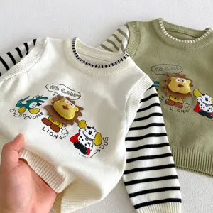 Detailed view of cute baby knit sweater set with cartoon animal embroidery and stripes.
