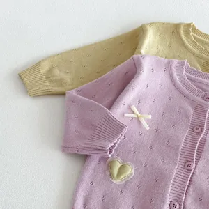 Baby knit cardigan detail, cute heart embroidery and bow, soft newborn sweater top.