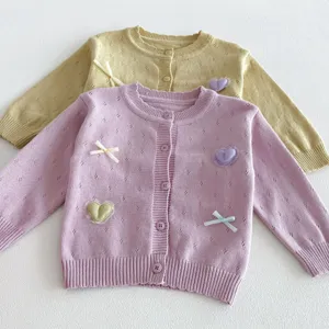 Toddler knit cardigan with cute heart and bow details, soft button-down sweater for baby girls.