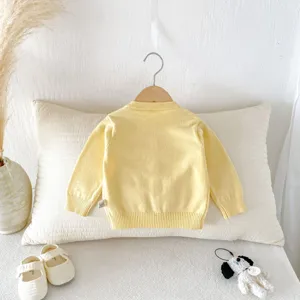 Infant baby girl cute knit cardigan sweater back view, soft yellow long sleeve outerwear.