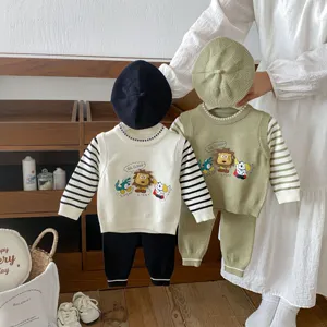 Baby autumn knit clothing set with sweater pants and cute cartoon embroidery for toddlers.