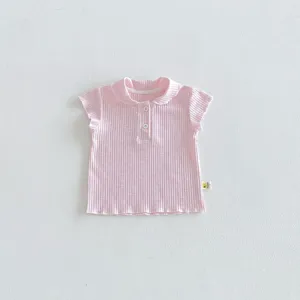 Close-up detail view of infant pink ribbed polo t-shirt collar, front buttons and soft knit fabric.