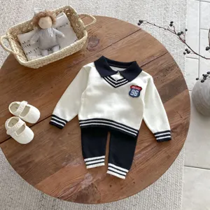 Toddler knit sweater and pants set, black and white color block detail, cozy fall outfit.