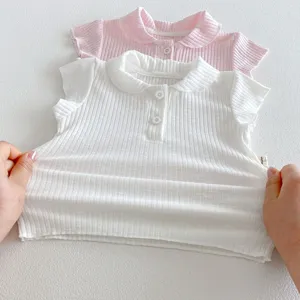 Infant baby rib knit polo short-sleeve t-shirt fabric detail showing stretchable white top.