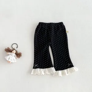 Korean style baby girl polka dot flared pants featuring cute lace hem and sweet bows.